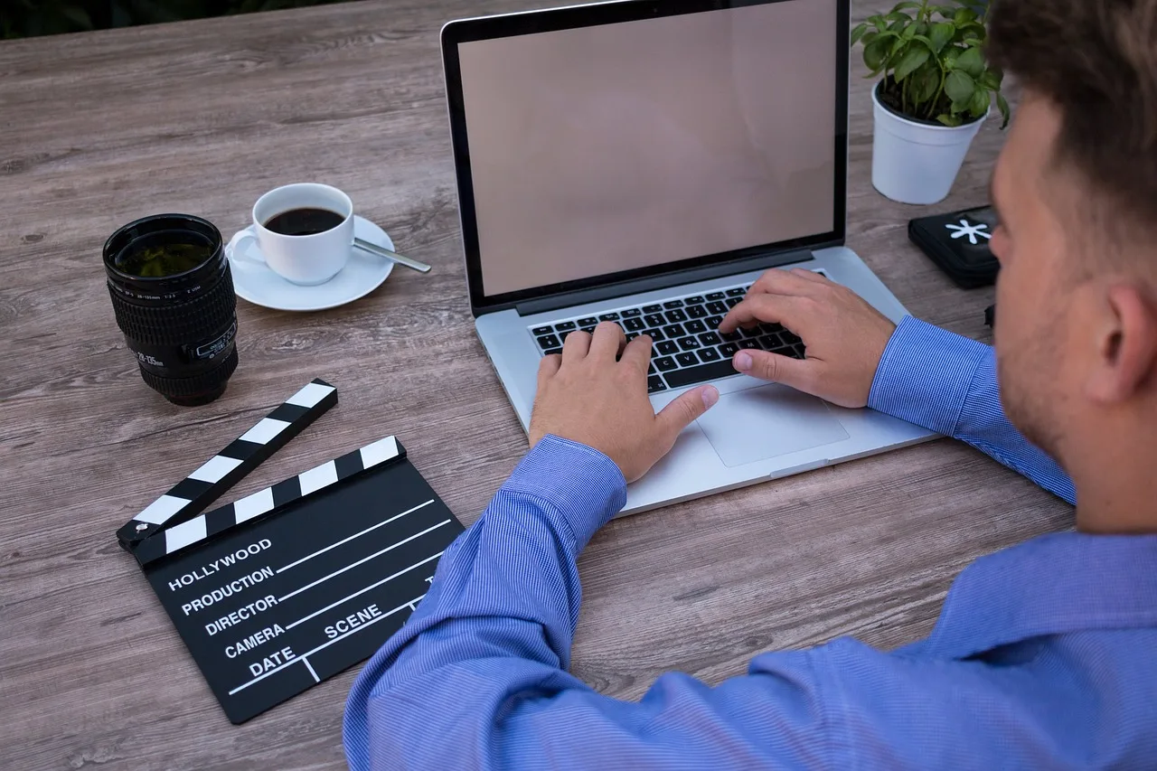 filmmakers, on the laptop, computer, macbook, movie, mockup, film producer, hobby, work, laptop, notebook, internet, apple, to blog, office, media literacy, desktop, designer, coffee, home office, freelancer, mac, technology, creative, youtuber, workplace, table, wood, short film, office table, digital, youtuber, youtuber, youtuber, youtuber, youtuber. Does YouTube Shorts algorithm retention decide whether a video keeps running?