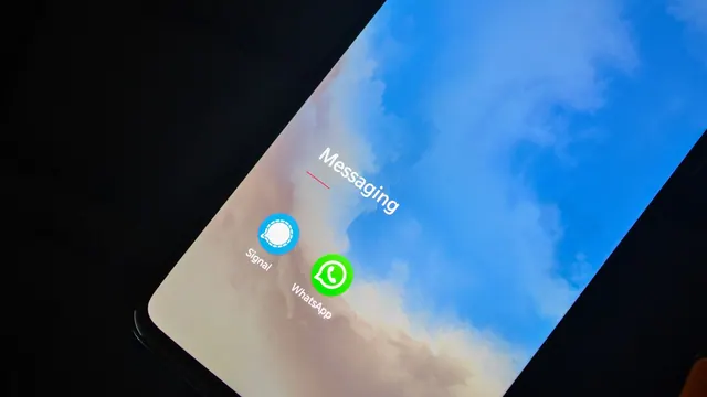 Close-up of smartphone screen showing Signal and WhatsApp messaging apps. Ranking signals updates 2027: guide and criteria