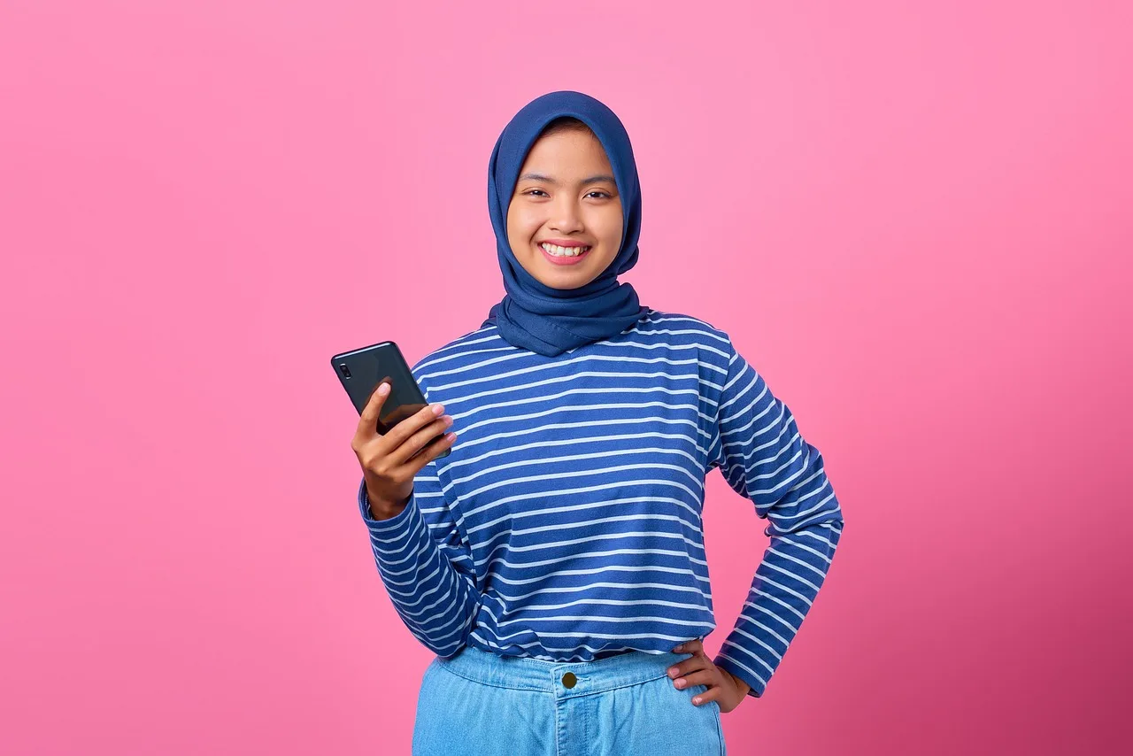 girl, smartphone, happy, portrait, smile, joyful, cellphone, teenager, hijab, charm, cheerful, mobile phone, online, phone, confidence, attractive, model, pose, asian, pink background, girl, smartphone, teenager, teenager, teenager, teenager, hijab, hijab, hijab, hijab, hijab, mobile phone, online, online, phone, confidence, confidence, pink background. Viral reach: six properties that decide whether strangers ever see it